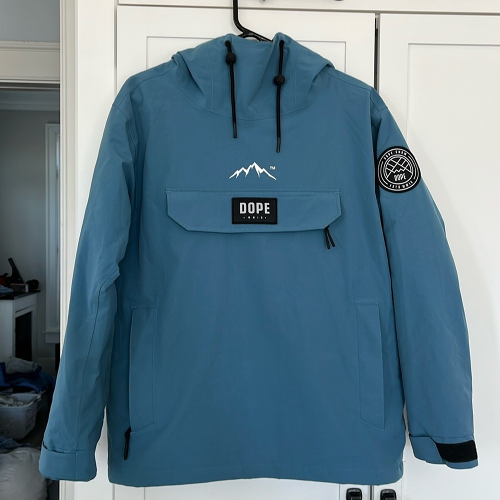 Dope snow pullover ski jacket. Pretty blue color. Barely worn, like brand new.